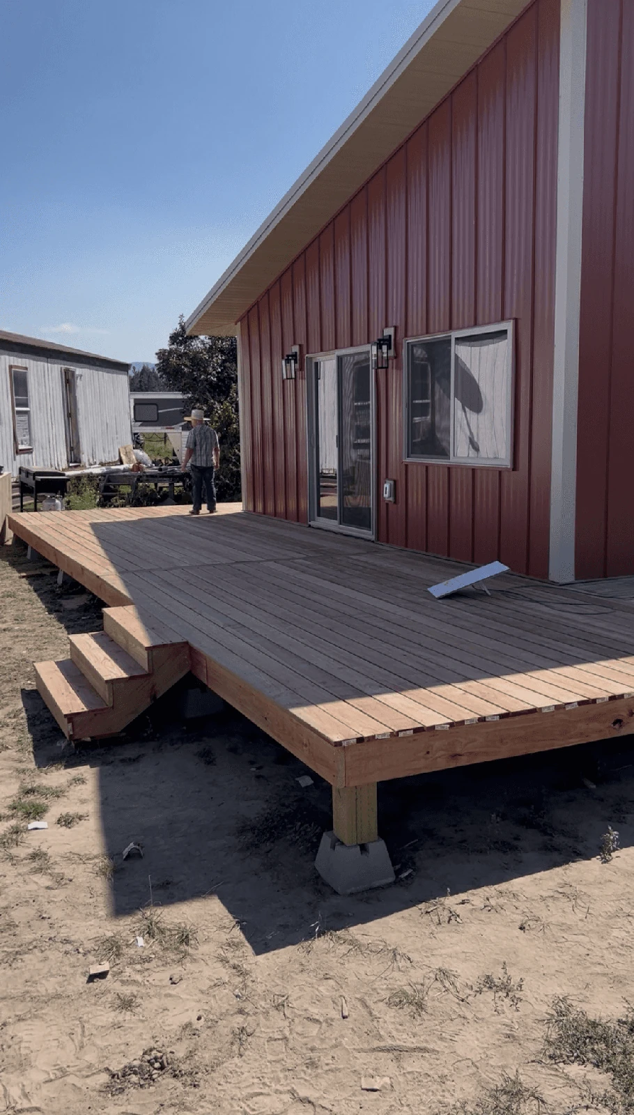 New deck beside a barn-like building